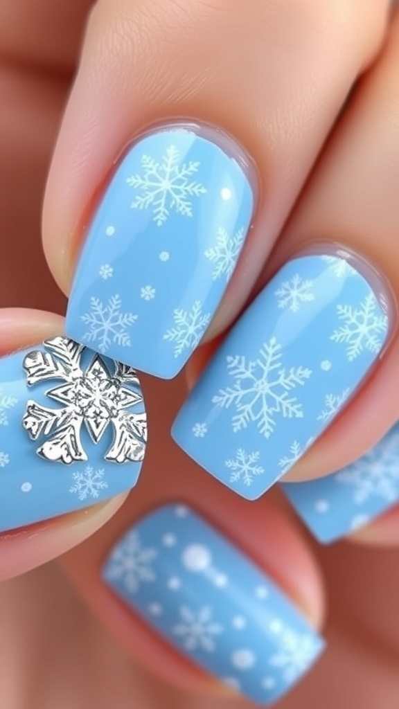 Close-up of blue Christmas nail art with snowflakes and glitter.